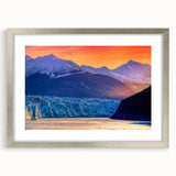 Textured abstract art print depicting Alaskan scenery in muted earth tones, framed in silver, ideal for bedroom art.