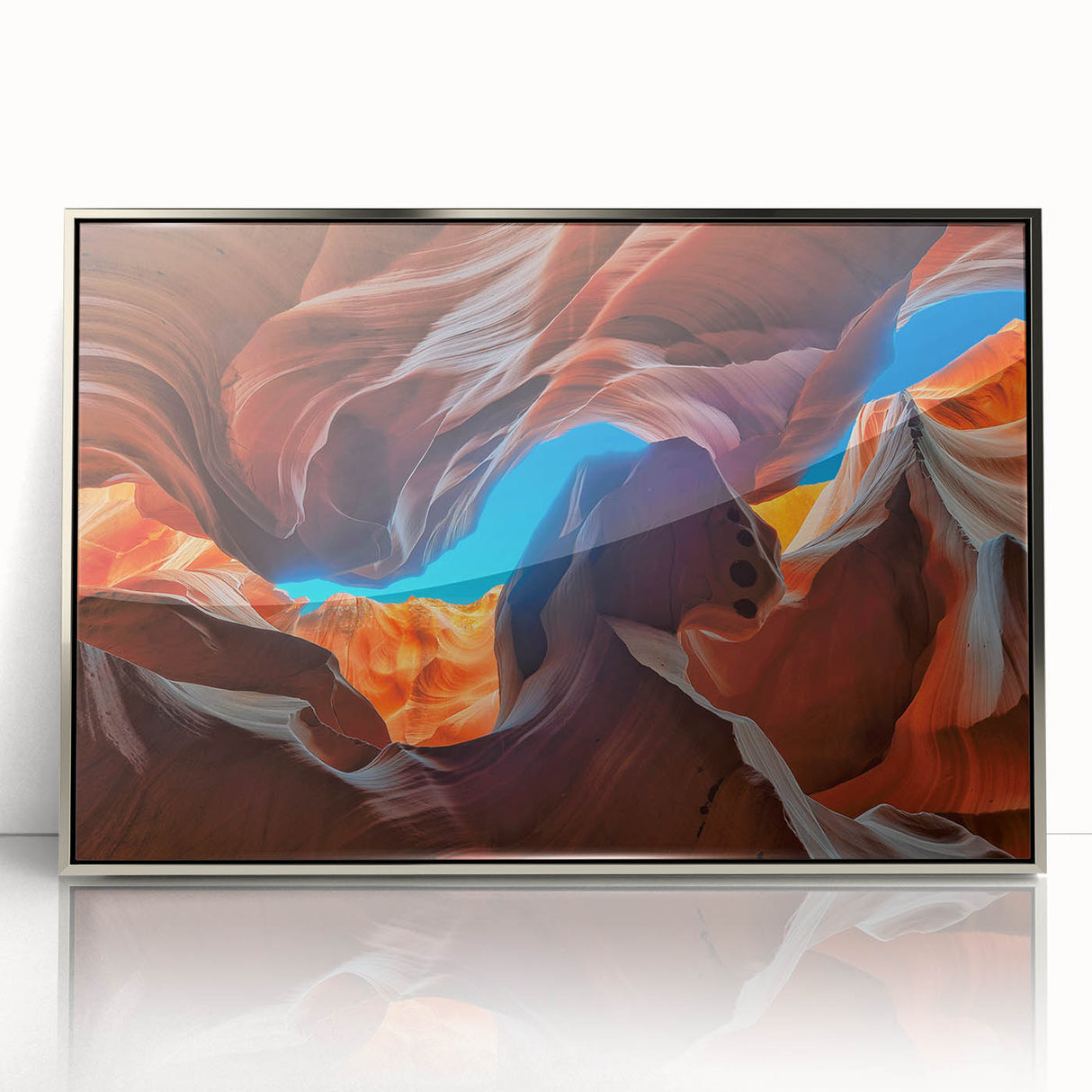 Mid-century modernist art of Antelope Canyon in Arizona on silver-framed acrylic, featuring earthy red and orange tones.