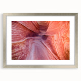 Textured art print of Coyote Buttes in Arizona, featuring abstract patterns in earth tones, framed in silver.