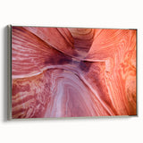 Framed canvas of Coyote Buttes in Arizona, featuring earthy red and orange tones.