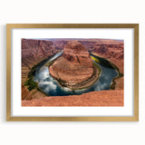 Extra large wall art featuring a textured abstract print of Arizona's Horseshoe Bend in muted earth tones, framed in gold.