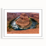 Abstract art print of Horseshoe Bend in Arizona, using muted earth tones on a framed white mat, ideal for dining room decor.