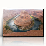Large abstract wall art of Arizona's Horseshoe Bend in muted earth tones, framed in black acrylic.