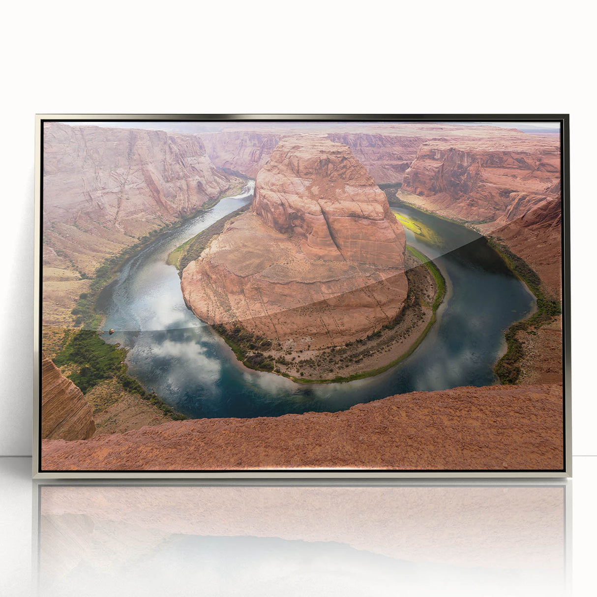 Mid-century modernist art of Arizona's Horseshoe Bend in silver-framed acrylic, featuring earthy tones.