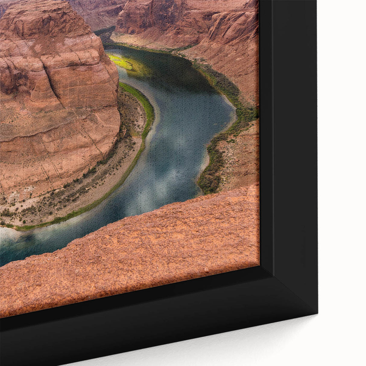 Framed canvas of Arizona's Horseshoe Bend in textured black tones with colorful accents.