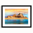 Colorful abstract art print of Lake Powell in vibrant blue and orange tones on a large textured canvas.