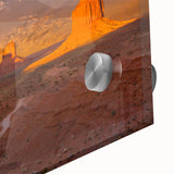Large abstract depiction of Monument Valley in muted earth tones on acrylic glass, suitable for dining room art.
