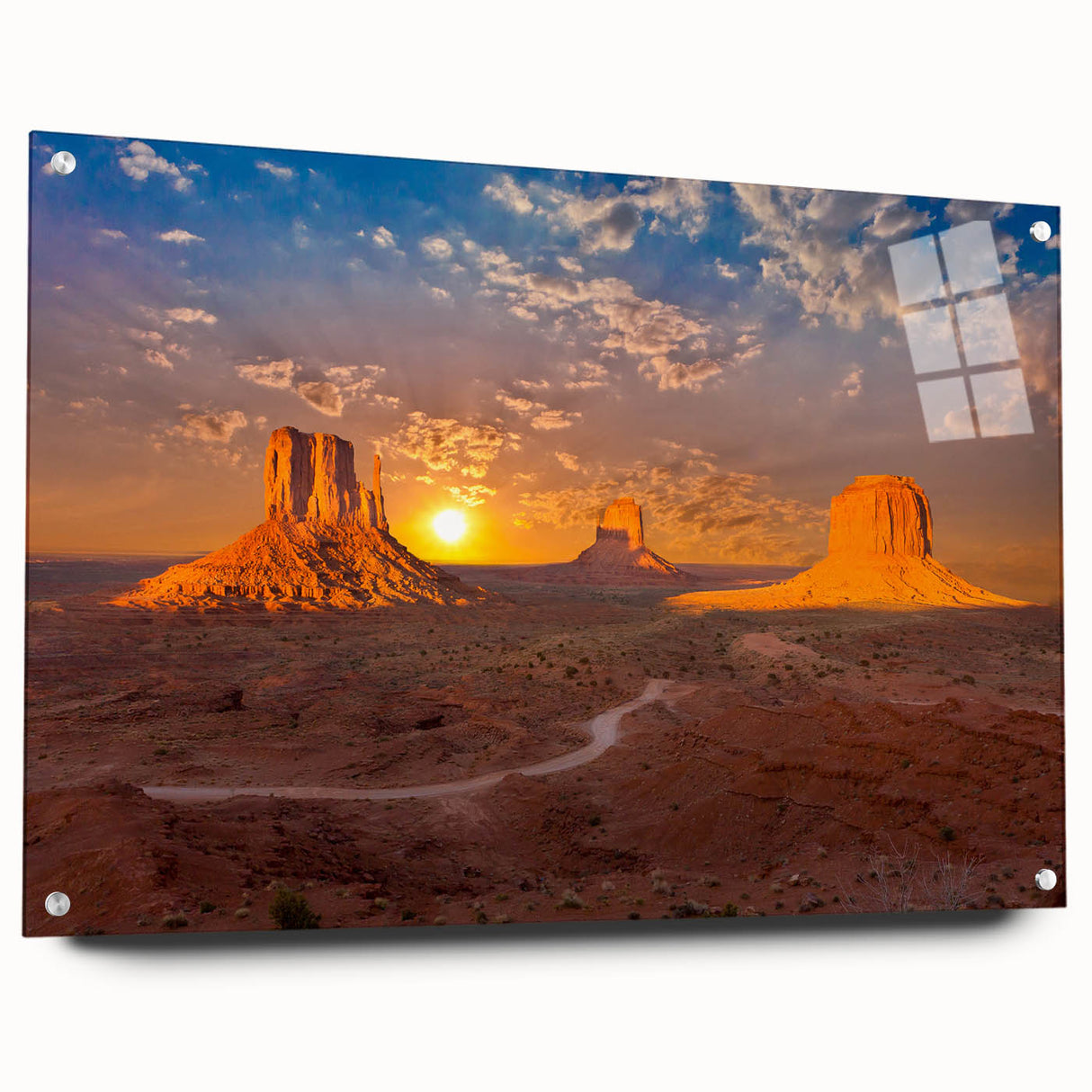 Acrylic print of Monument Valley with vivid red and orange tones, suitable for dining room decor.