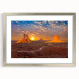 Textured art print of Monument Valley in muted earth tones on a framed canvas, suitable for bedroom decor.