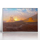 Acrylic print of Monument Valley with muted earth tones in a white frame, suitable for modern art wall decor.