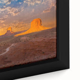 Extra large framed canvas of Monument Valley in black with vibrant, textured colors, ideal for living room decor.