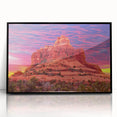 Large abstract wall art depicting the Sedona landscape, in warm earth tones, framed in black acrylic.