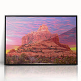 Large abstract wall art depicting the Sedona landscape, in warm earth tones, framed in black acrylic.