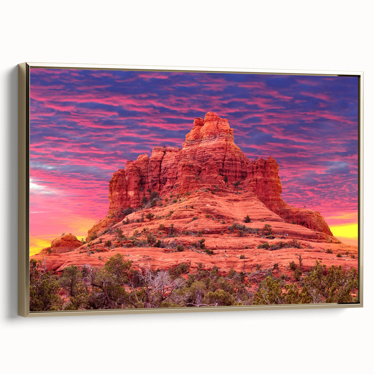 Framed canvas featuring a vintage-style landscape painting of Sedona, Arizona, in muted earth tones.