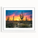Abstract art print of the Sonoran Desert in muted earth tones on a framed white mat, suitable for dining room decor.