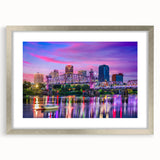 Textured abstract art print of Arkansas scenery in muted earth tones, framed in silver, ideal for bedroom decor.