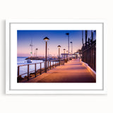 Abstract art print of Catalina, California in muted blue and green shades on a white-framed canvas.
