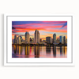 Abstract art print of Coronado, California in muted blue and gray tones on a framed white mat.