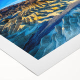 Art deco poster of Death Valley in muted earth tones on rolled canvas, suitable for dining room decor.