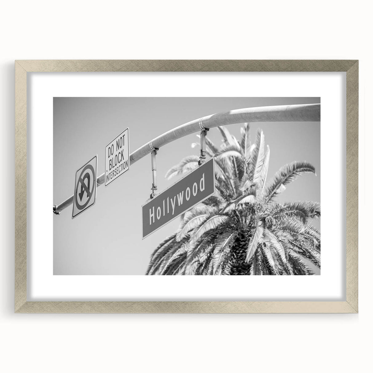 Textured abstract art print of the Hollywood, California scenery in muted earth tones on a framed silver canvas.