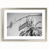 Textured abstract art print of the Hollywood, California scenery in muted earth tones on a framed silver canvas.