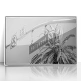 Art deco poster of Hollywood, California in muted gold and white tones on framed acrylic.