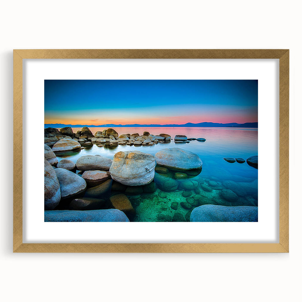 Extra large abstract art print of Lake Tahoe in textured colors, framed in gold, ideal for living room decor.