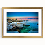 Extra large abstract art print of Lake Tahoe in textured colors, framed in gold, ideal for living room decor.