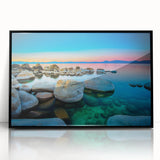 Large abstract wall art of Lake Tahoe in muted blue and green tones, acrylic print in a black frame.