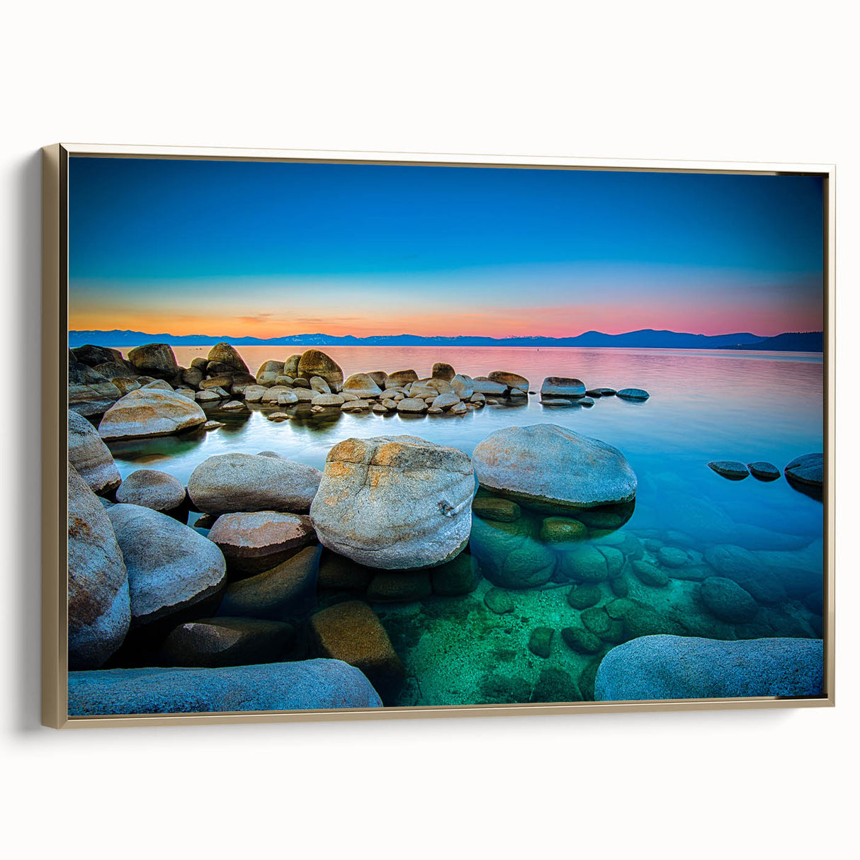 Framed canvas of Lake Tahoe landscape in muted blues and greens, ideal for bedroom wall art.