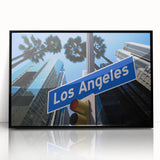 Large abstract wall art depicting the Los Angeles skyline in muted gray and blue tones, framed in black acrylic.
