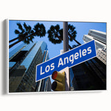 Vintage poster art of Los Angeles skyline in colorful hues on a large framed canvas, ideal for living room decor.