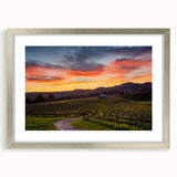 Textured abstract art print of Napa Valley in muted earth tones, framed in silver, ideal for bedroom wall decor.