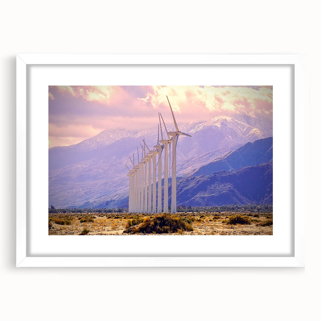 Abstract art print of Palm Springs with pastel hues on framed white canvas, ideal for dining room decor.