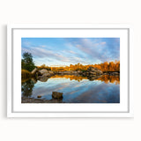 Abstract art print of Sacramento skyline in muted blue and gray tones on a white framed canvas, ideal for dining room decor.