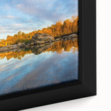 Close-up of a textured black wall art depicting Sacramento scenery on a framed canvas with colorful accents.