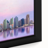 Black wall art featuring a textured depiction of the San Diego skyline with vibrant hues, framed canvas.