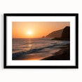 Abstract art print of Santa Monica scenery in vibrant colors on a black-framed, matted canvas, ideal for living room decor.