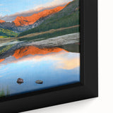 Close-up of a framed canvas depicting a textured, colorful abstract interpretation of Vail, Colorado.