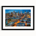 Colorful abstract art print of Denver skyline in vibrant hues on a large framed canvas, ideal for living room decor.