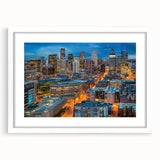 Abstract art print of Denver skyline in muted gray and blue tones on a framed canvas, ideal for dining room decor.