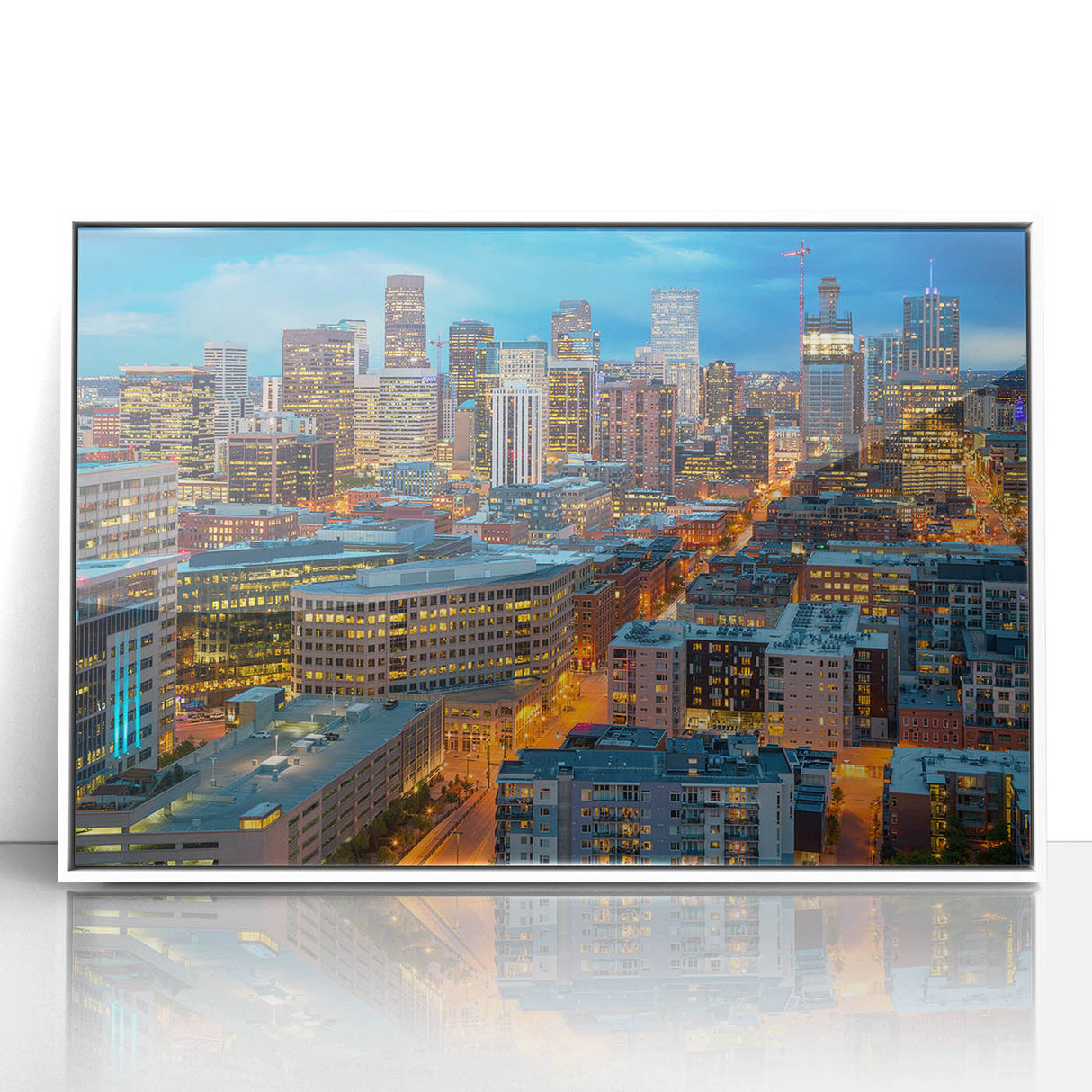 Modern art wall decor featuring a Denver skyline in muted gray and blue tones on a framed acrylic print.