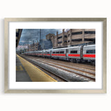 Textured abstract art print depicting a serene Connecticut landscape in muted green and blue tones, framed in silver.