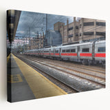 Large art depicting a serene Connecticut landscape on stretched canvas, in soft green and blue tones.