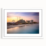 Abstract art print of Daytona scenery in muted blue and green hues on a white framed poster, suitable for dining room decor.