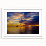 Abstract art print of the Florida Keys in pastel blue and green shades on a framed white mat, ideal for dining room decor.