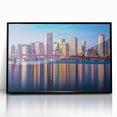 Large abstract wall art of Miami skyline in muted gray and blue tones on framed acrylic, ideal for modern living room decor.