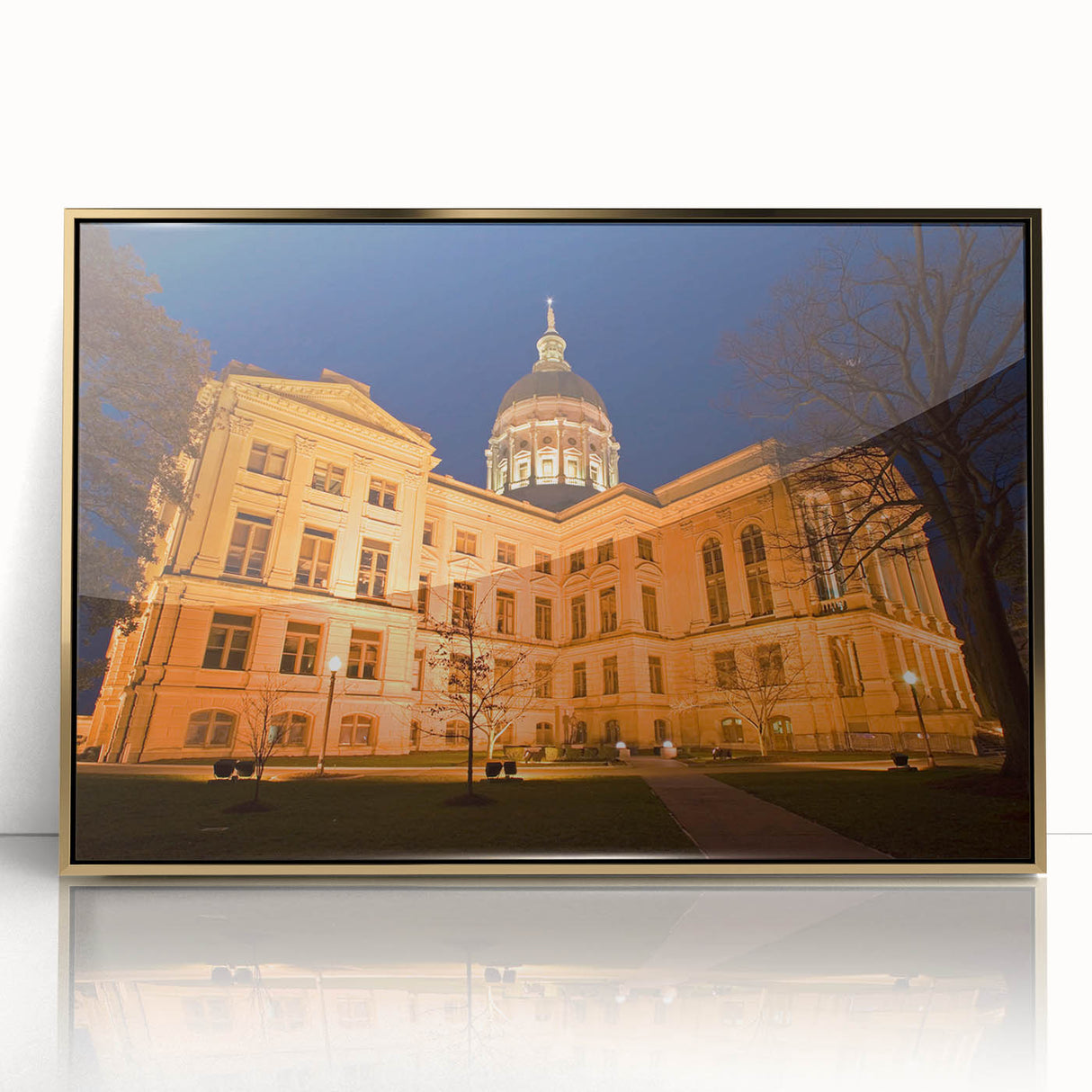 Mid-century modernist Atlanta skyline in gold and black hues on a framed acrylic, ideal for modern art wall decor.