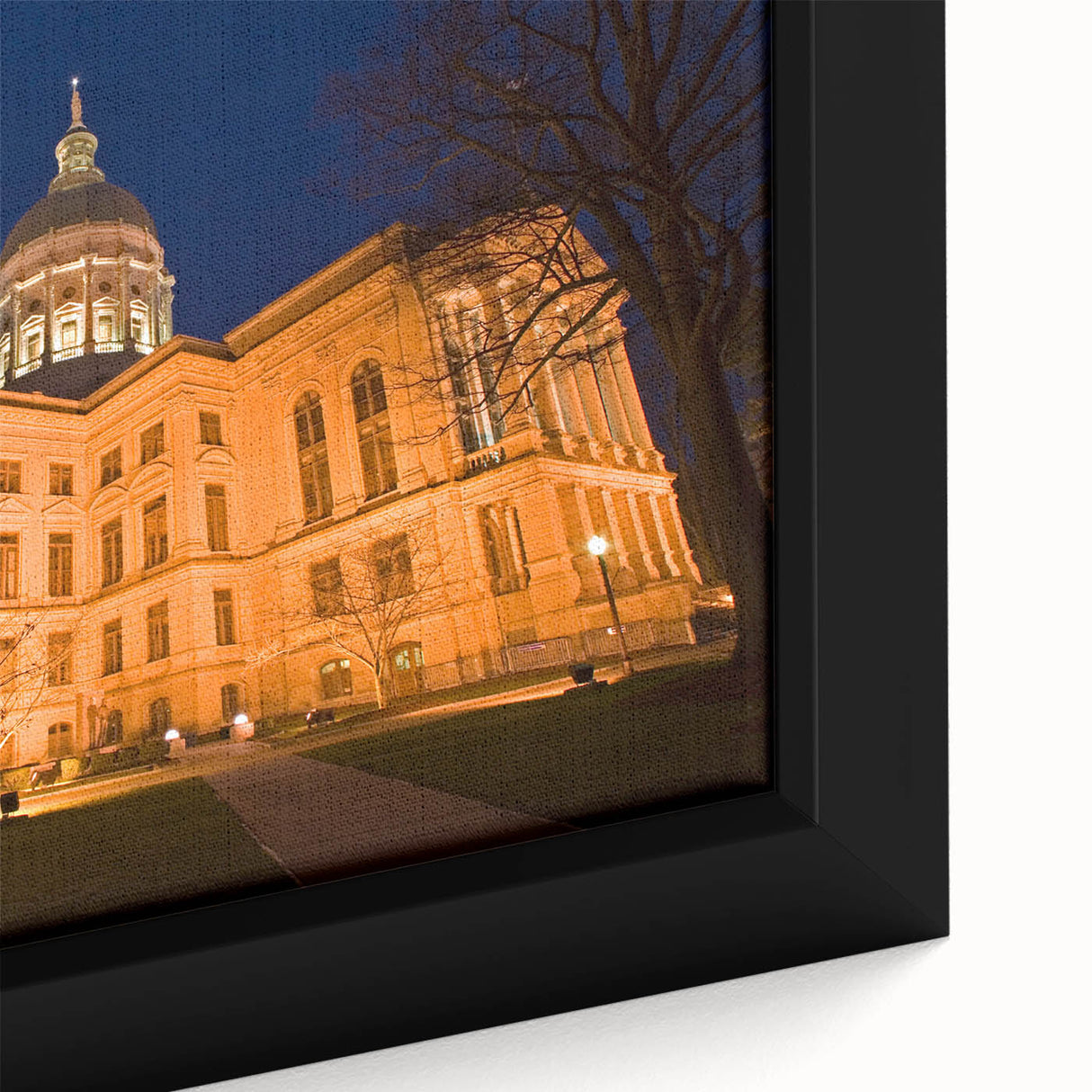 Textured black wall art of Atlanta skyline with vibrant colors on a large framed canvas, ideal for living room decor.