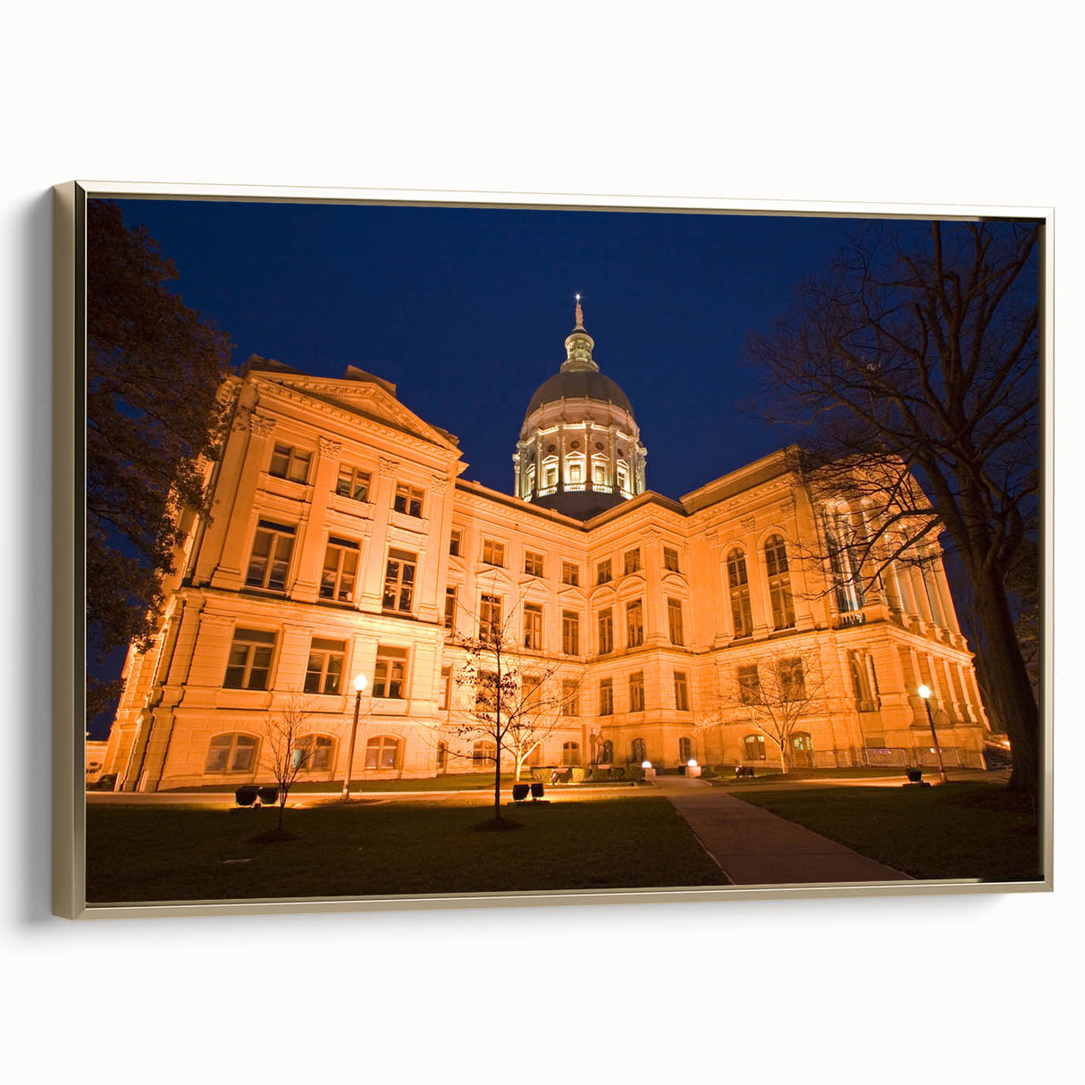 Framed canvas featuring a vintage-style Atlanta skyline in black and gold tones, ideal for bedroom wall art.
